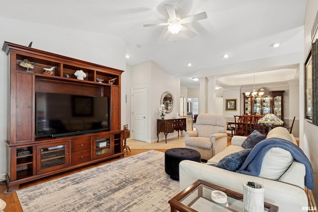 1361 Pinnacle Pines Ct, Bettendorf, IA 52722 - living area with decorative columns, a ceiling fan, light wood-type flooring, recessed lighting, and lofted ceiling