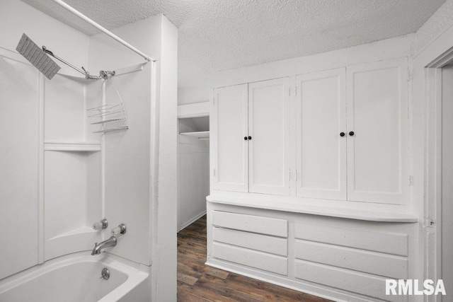 1603 Judson St, Davenport, IA 52803 - bathroom with a textured ceiling, shower / bath combination, and wood finished floors