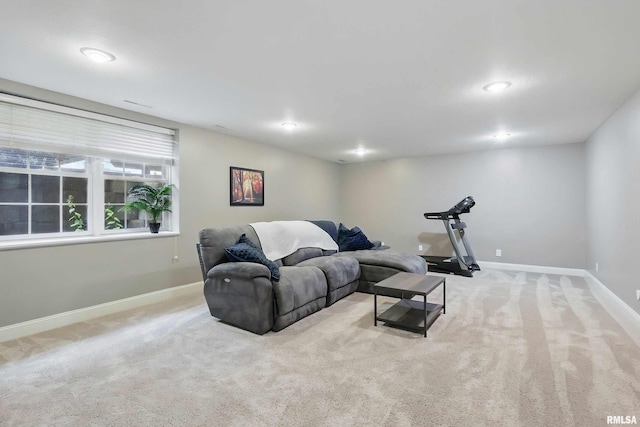 6732 Brookview Ln, Davenport, IA 52806 - carpeted living room featuring baseboards and recessed lighting