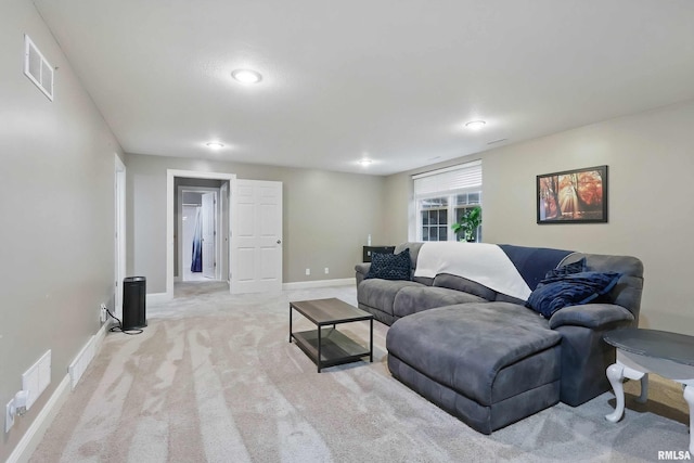 6732 Brookview Ln, Davenport, IA 52806 - living area featuring baseboards, carpet, and recessed lighting