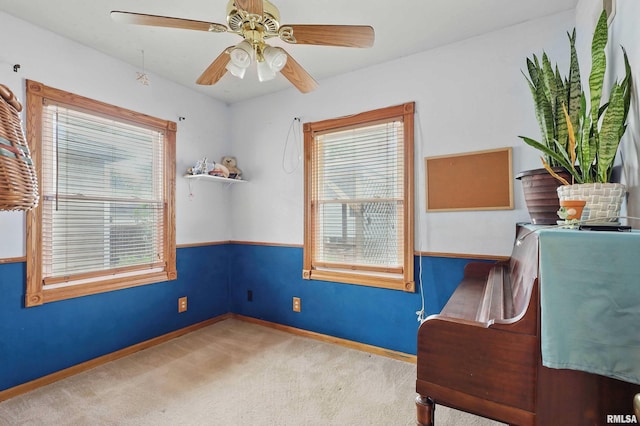 3129 Harrison St, Davenport, IA 52803 - unfurnished room featuring ceiling fan, carpet floors, and baseboards