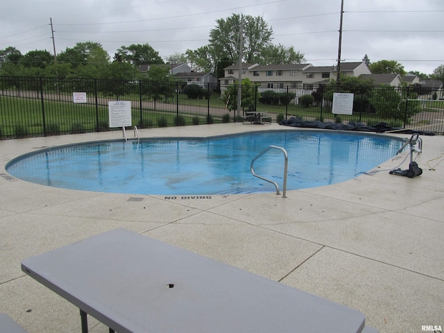 4186 Fairview Dr Unit 5, Bettendorf, IA 52722 - community pool featuring a patio
