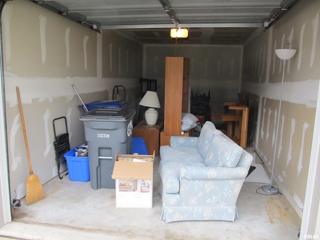4186 Fairview Dr Unit 5, Bettendorf, IA 52722 - garage featuring a garage door opener