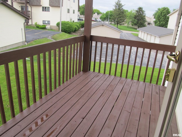 4186 Fairview Dr Unit 5, Bettendorf, IA 52722 - wooden terrace with a residential view and a lawn