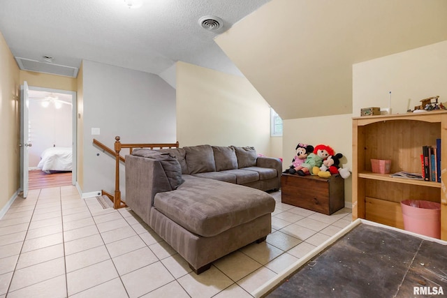 1816 Calico Rd, Marion, IL 62959 - living room featuring light tile patterned floors, baseboards, and vaulted ceiling