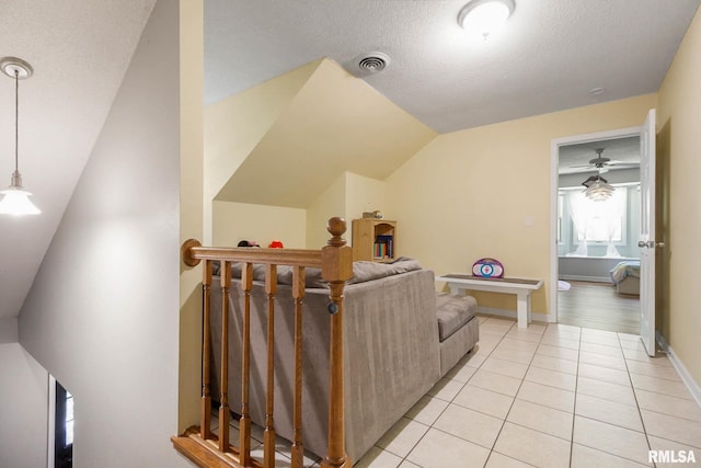 1816 Calico Rd, Marion, IL 62959 - living area featuring light tile patterned floors, a textured ceiling, ceiling fan, and baseboards