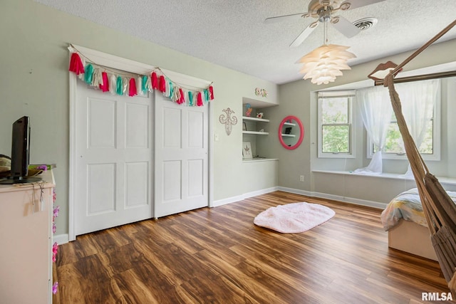 1816 Calico Rd, Marion, IL 62959 - bedroom featuring a textured ceiling and wood finished floors