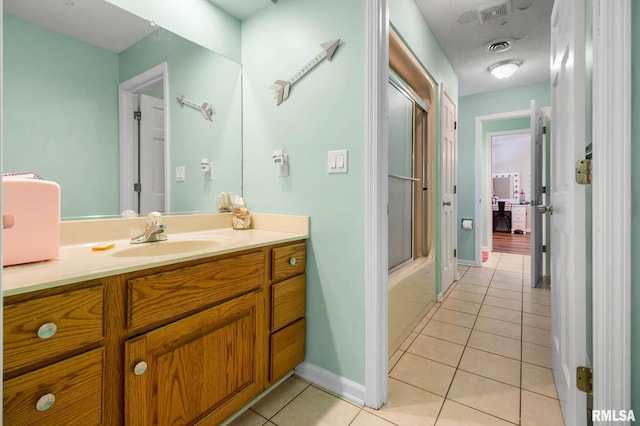 1816 Calico Rd, Marion, IL 62959 - bathroom with vanity, tile patterned flooring, and a shower with shower door