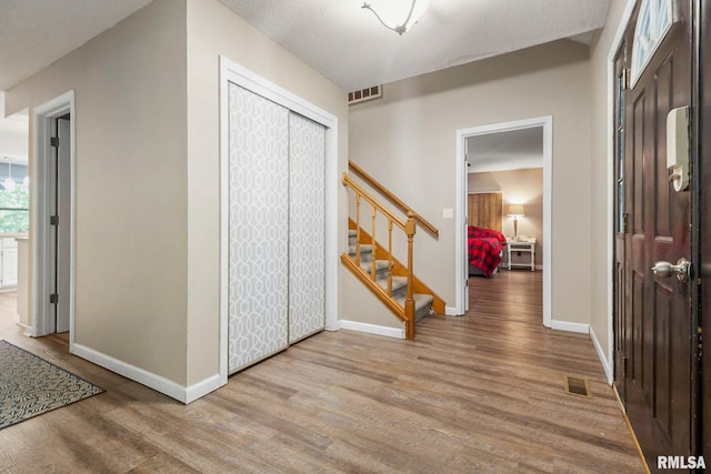 1816 Calico Rd, Marion, IL 62959 - entrance foyer with wood finished floors and stairway