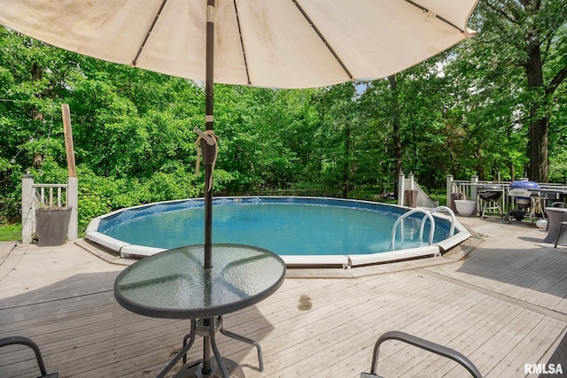 1816 Calico Rd, Marion, IL 62959 - swimming pool with a wooden deck and outdoor dining space
