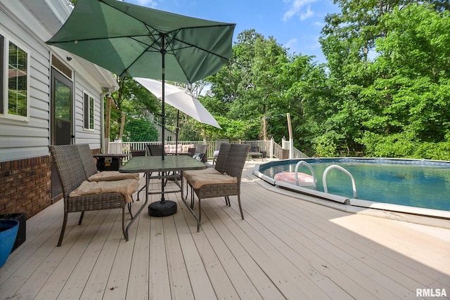 1816 Calico Rd, Marion, IL 62959 - deck featuring outdoor dining space and an outdoor pool