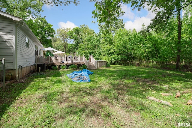 1816 Calico Rd, Marion, IL 62959 - view of yard featuring a deck, view of scattered trees, and a shed