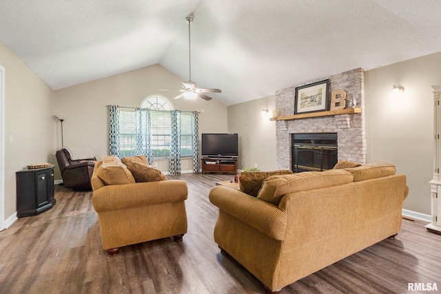 1816 Calico Rd, Marion, IL 62959 - living area featuring a brick fireplace, ceiling fan, dark wood-type flooring, lofted ceiling, and baseboards
