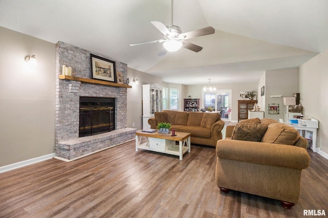 1816 Calico Rd, Marion, IL 62959 - living area with a fireplace, a ceiling fan, wood finished floors, a chandelier, and high vaulted ceiling
