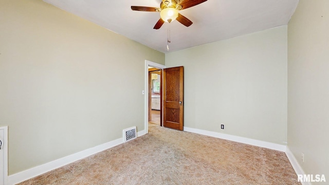 506 18th Ave, Moline, IL 61265 - carpeted empty room featuring ceiling fan and baseboards