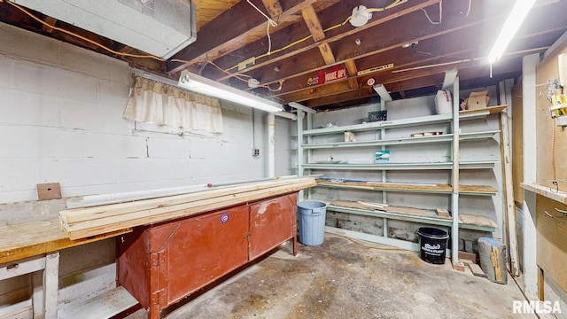 506 18th Ave, Moline, IL 61265 - unfinished basement featuring a workshop area