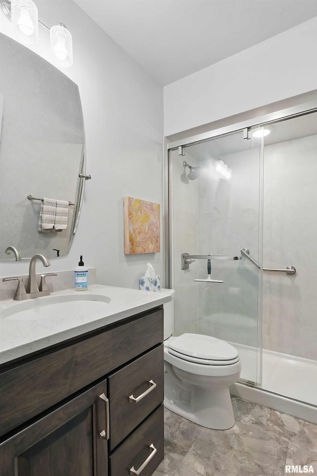 1104 Kimberly Rd Unit 1006, Bettendorf, IA 52722 - full bath featuring vanity, a shower stall, toilet, and marble finish flooring