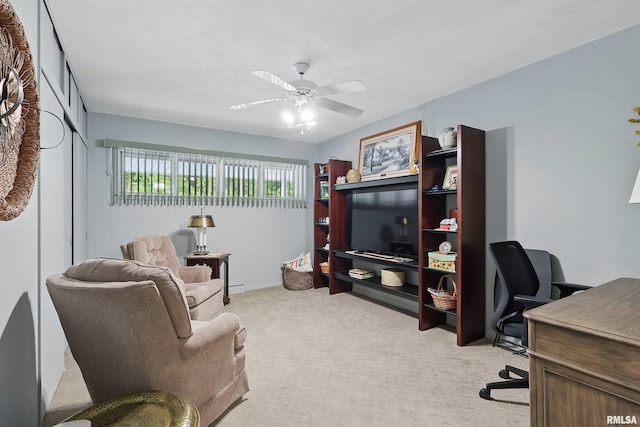 1104 Kimberly Rd Unit 1006, Bettendorf, IA 52722 - home office featuring light colored carpet, a ceiling fan, and baseboards