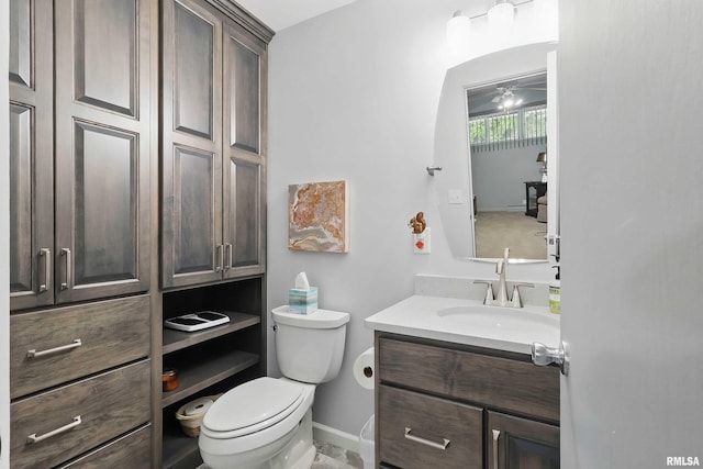1104 Kimberly Rd Unit 1006, Bettendorf, IA 52722 - half bathroom with vanity, toilet, and baseboards