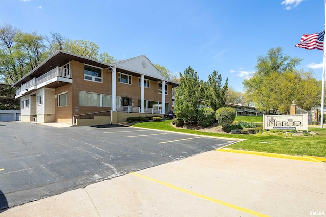 1104 Kimberly Rd Unit 1006, Bettendorf, IA 52722 - view of property with uncovered parking