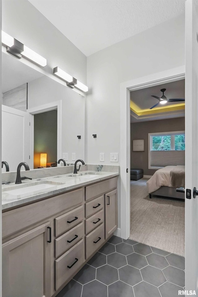 1327 Heights Ct, Bettendorf, IA 52803 - full bathroom featuring ensuite bath, double vanity, ceiling fan, and tile patterned flooring