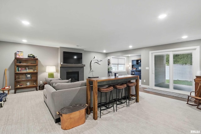 1327 Heights Ct, Bettendorf, IA 52803 - living room featuring a glass covered fireplace, recessed lighting, and healthy amount of natural light