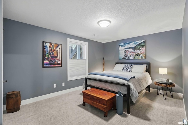 1327 Heights Ct, Bettendorf, IA 52803 - bedroom featuring a textured ceiling, baseboards, and carpet flooring