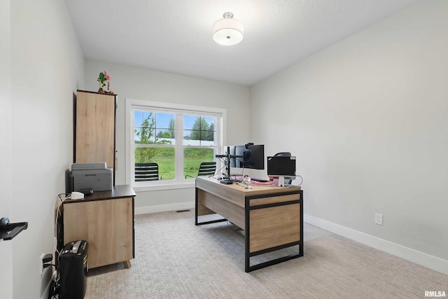 1327 Heights Ct, Bettendorf, IA 52803 - office space with baseboards, light carpet, and a textured ceiling