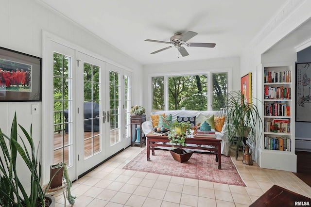 923 22nd St, Moline, IL 61265 - sunroom / solarium featuring french doors, healthy amount of natural light, and a baseboard heating unit