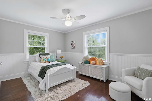 923 22nd St, Moline, IL 61265 - bedroom with a wainscoted wall, multiple windows, dark wood-style flooring, ornamental molding, and a ceiling fan