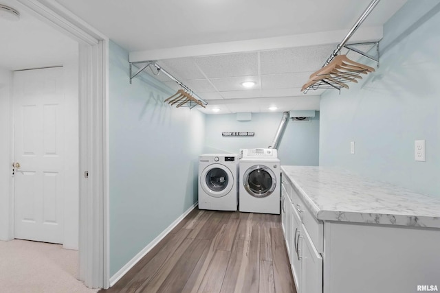 923 22nd St, Moline, IL 61265 - laundry area featuring cabinet space, separate washer and dryer, wood finished floors, baseboards, and recessed lighting