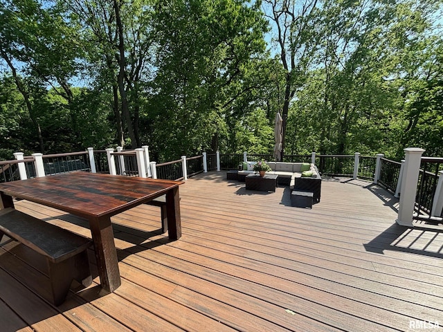 923 22nd St, Moline, IL 61265 - wooden deck with an outdoor living space, outdoor dining area, and view of scattered trees