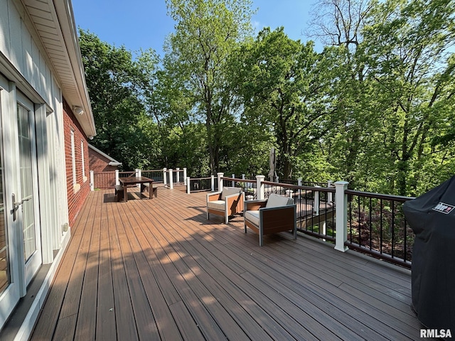 923 22nd St, Moline, IL 61265 - wooden terrace with view of wooded area and a grill