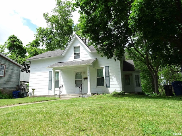 1916 E 13th St, Davenport, IA 52803 - bungalow-style house with a front lawn, covered porch, and a shingled roof