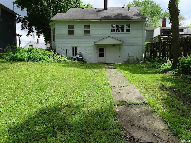 1916 E 13th St, Davenport, IA 52803 - rear view of house with a chimney