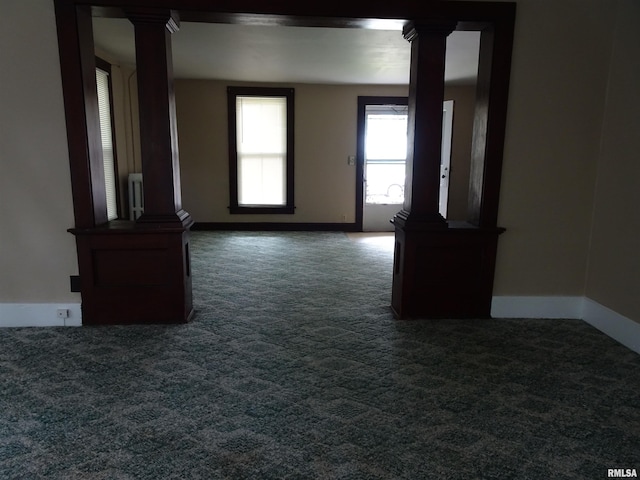 1916 E 13th St, Davenport, IA 52803 - empty room with carpet flooring, ornate columns, and baseboards