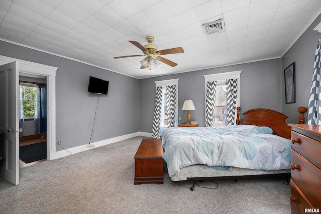503 SW 4th Ave, Galva, IL 61434 - carpeted bedroom featuring crown molding and ceiling fan