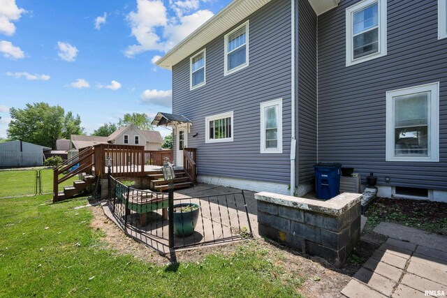 503 SW 4th Ave, Galva, IL 61434 - rear view of house with a yard and a deck