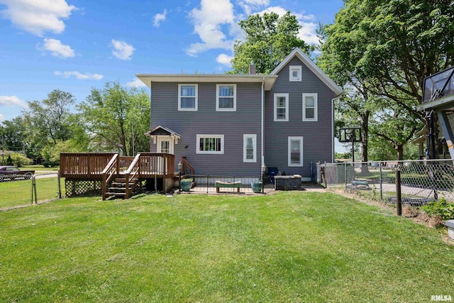 503 SW 4th Ave, Galva, IL 61434 - back of house with a wooden deck, a gate, a chimney, and a patio area
