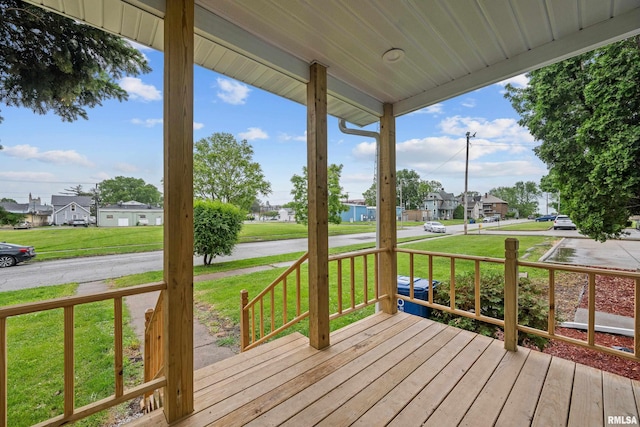 1312 Ripley St, Davenport, IA 52803 - wooden porch with a residential view and a yard