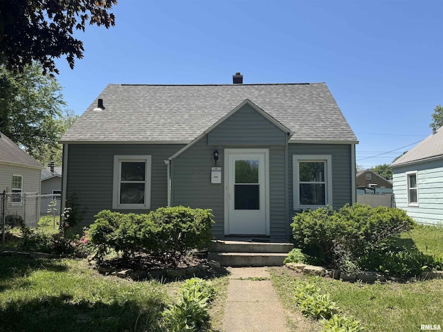 2121 4th St, Moline, IL 61265 - bungalow-style house with roof with shingles and a chimney