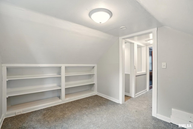 2121 4th St, Moline, IL 61265 - bonus room featuring carpet, vaulted ceiling, and baseboards