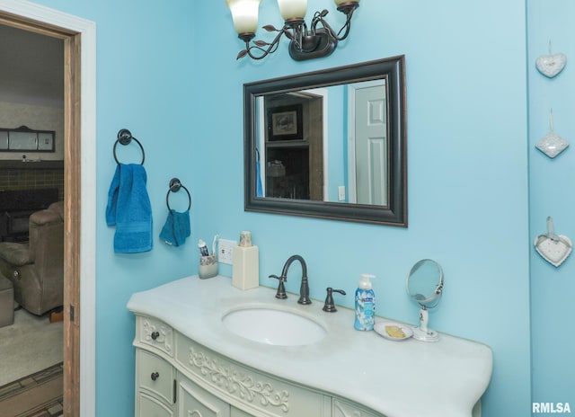 2015 N Zenith Ave, Davenport, IA 52804 - bathroom with a chandelier and vanity