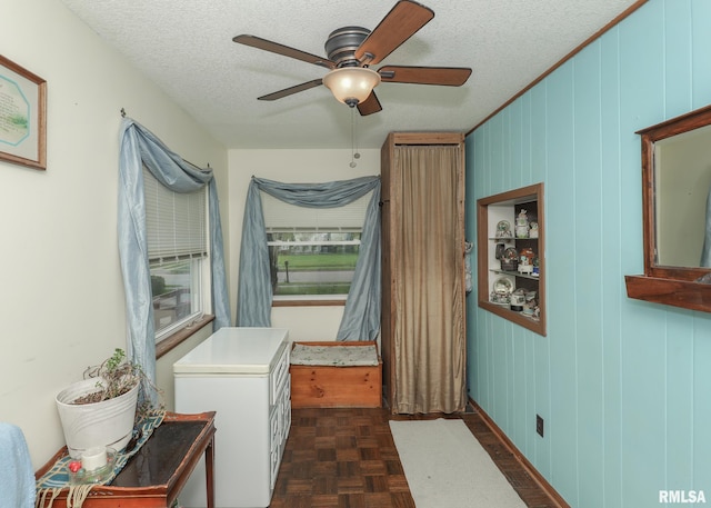 2015 N Zenith Ave, Davenport, IA 52804 - washroom featuring ceiling fan and a textured ceiling