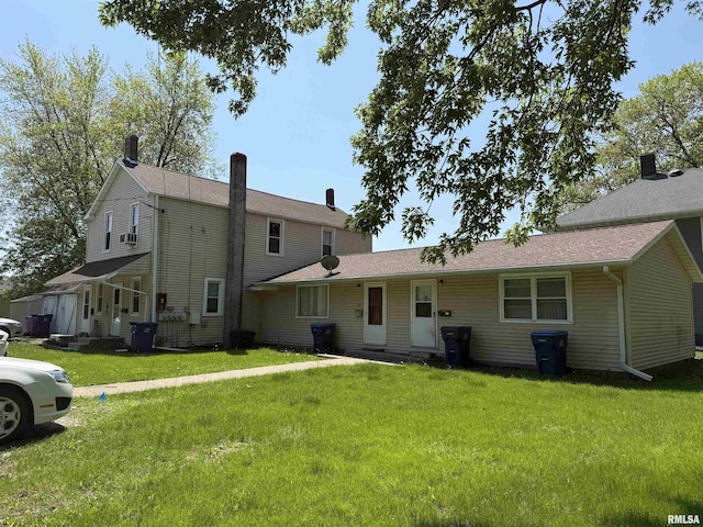 105-109 NE 5th Ave, Aledo, IL 61231 - rear view of house with a yard
