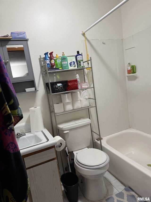 105-109 NE 5th Ave, Aledo, IL 61231 - bathroom with toilet, washtub / shower combination, tile patterned floors, and vanity