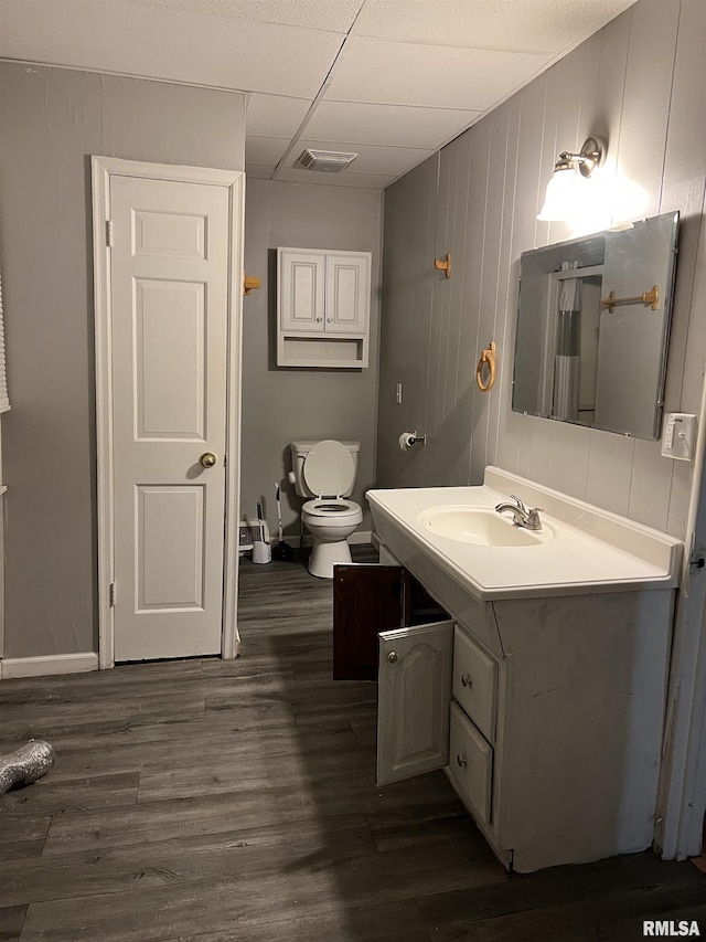 105-109 NE 5th Ave, Aledo, IL 61231 - bathroom featuring vanity, wood finished floors, and toilet