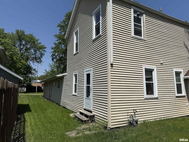 105-109 NE 5th Ave, Aledo, IL 61231 - view of side of home with entry steps and a yard