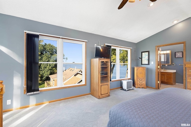 22867 Great River Rd, Le Claire, IA 52753 - bedroom featuring vaulted ceiling, baseboards, carpet floors, ensuite bath, and ceiling fan