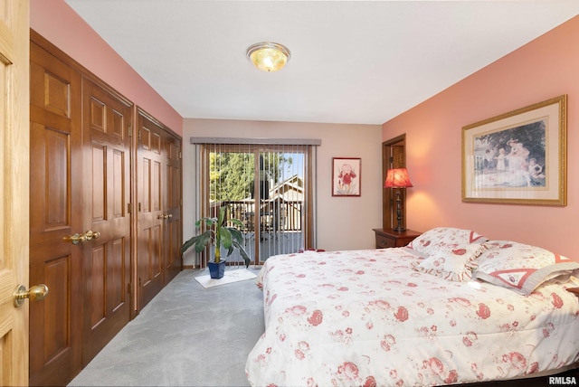 22867 Great River Rd, Le Claire, IA 52753 - carpeted bedroom featuring access to exterior